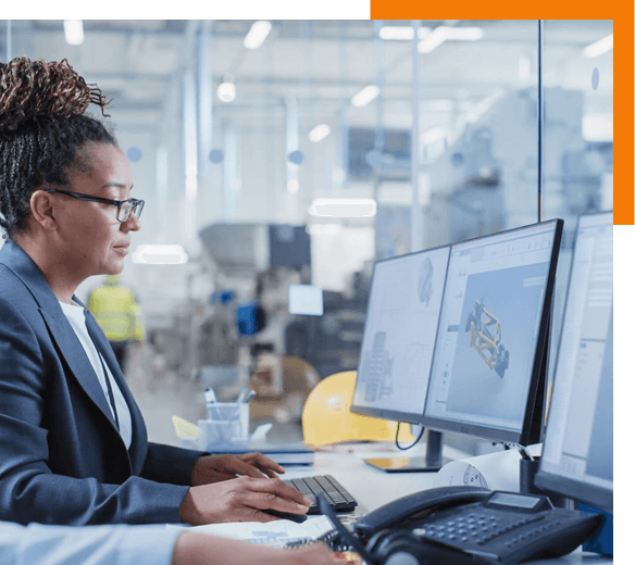 A woman learning advanced manufacturing software at AdvanceNC